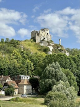 Historic French castle on top of hill - A Timeline of French History and the Acadians